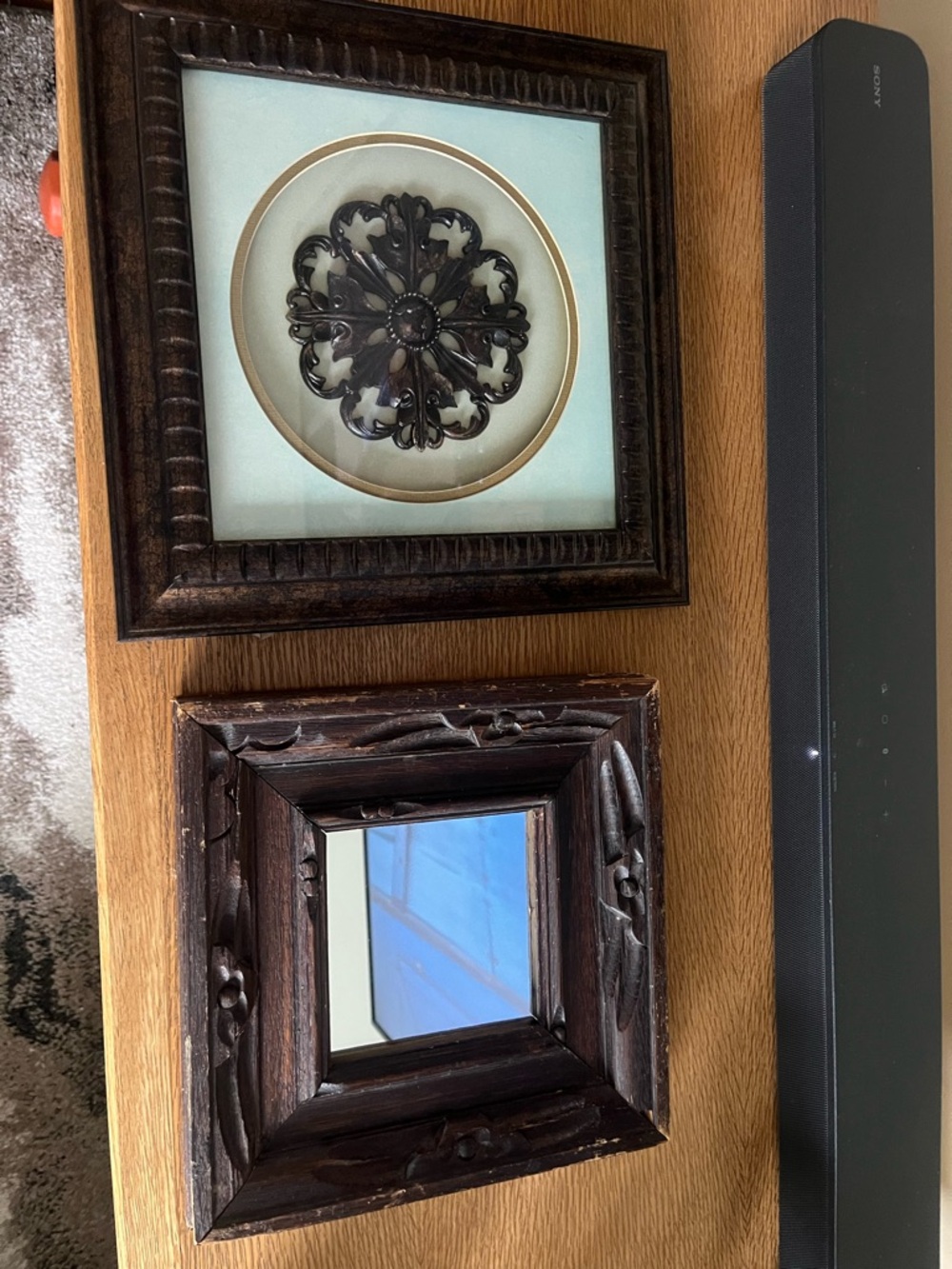 Set of Two Dark Wood Decorative Wall Accents with Metal Medallion & Mirror